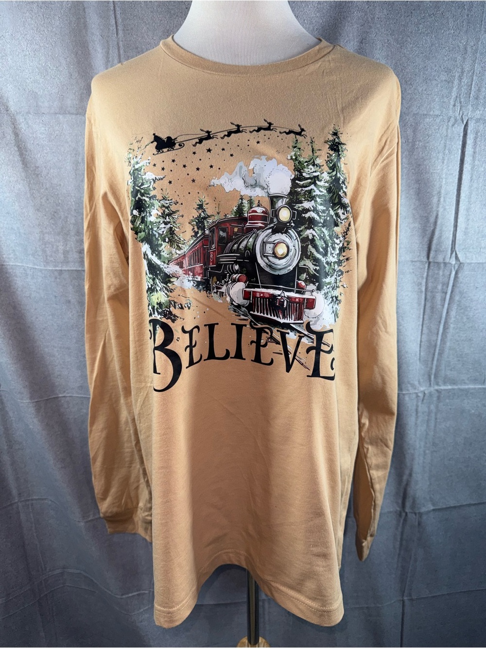 2423-Bella Canvas Tan "Believe" Holiday Train Long-Sleeve Tee